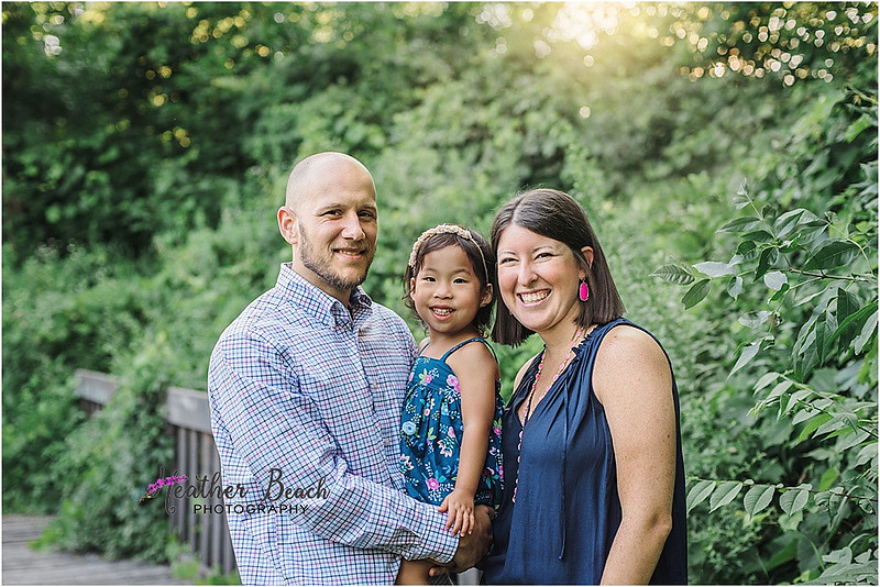 Sun Prairie family photographer, Madison family photographer, outdoor photography, sunset photography, family of 3, bridge, stones