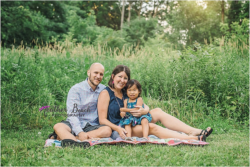 Sun Prairie family photographer, Madison family photographer, outdoor photography, sunset photography, family of 3, bridge, stones
