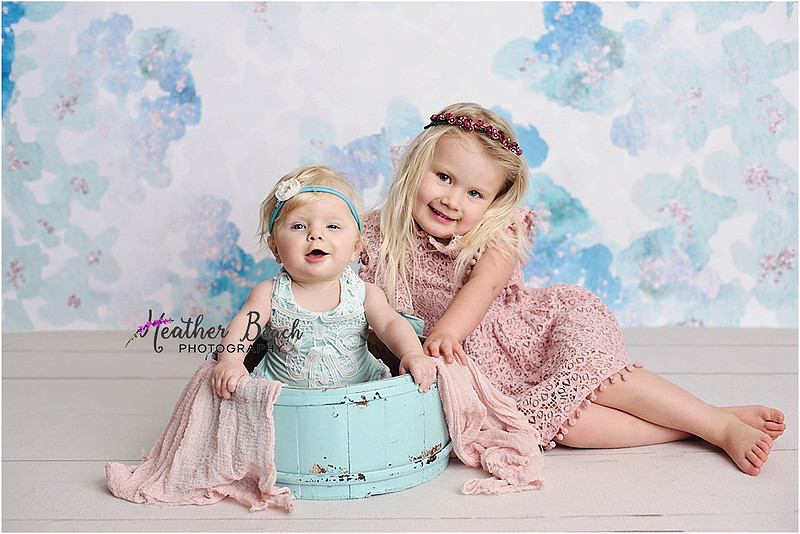 Sun Prairie baby photographer, Sun Prairie child photographer, Sun Prairie portrait photographer, Madison baby photographer, studio photos, flash photography, baby photos in Sun Prairie studio, cradle, dresses, bucket, sisters, two sisters in studio photography