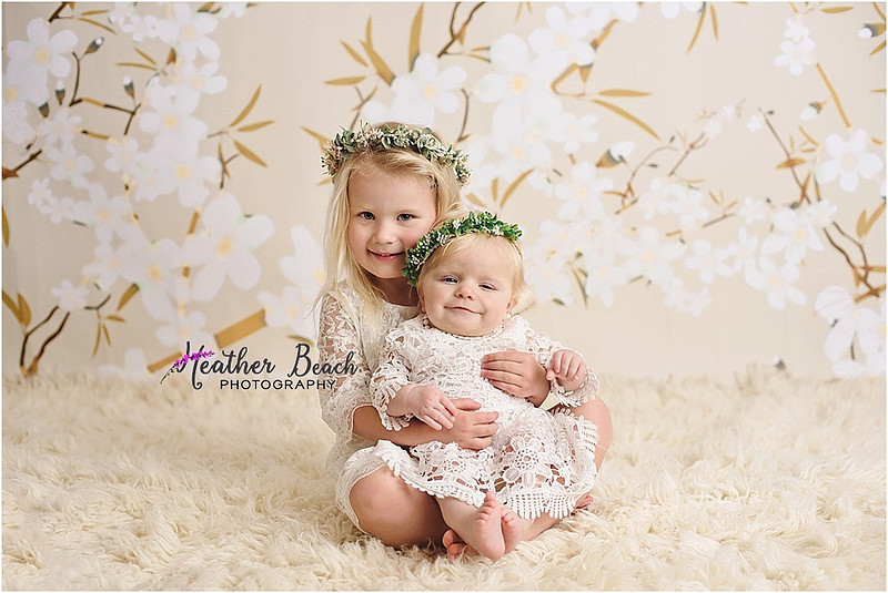 Sun Prairie baby photographer, Sun Prairie child photographer, Sun Prairie portrait photographer, Madison baby photographer, studio photos, flash photography, baby photos in Sun Prairie studio, cradle, dresses, bucket, sisters, two sisters in studio photography