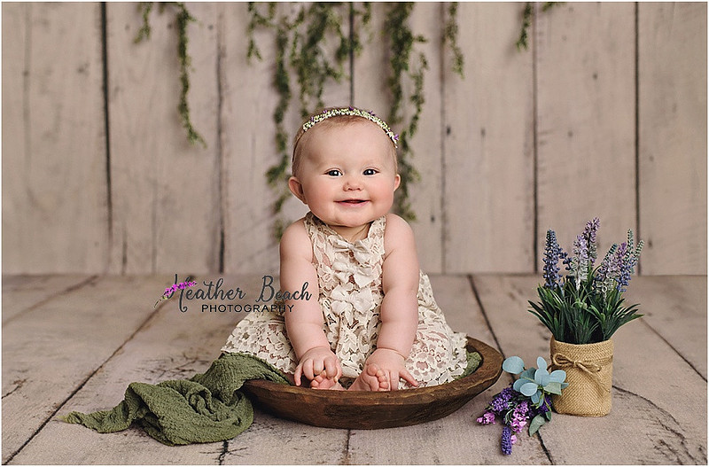 Sun Prairie baby photographer, Sun Prairie portrait photographer, Sun Prairie child photographer, Madison baby photographer, Madison portrait photographer, 6 month old, baby girl, halo headband, flowers, wood, cute baby, cute baby pics, studio photography, child photography, baby photography, Sun Prairie studio